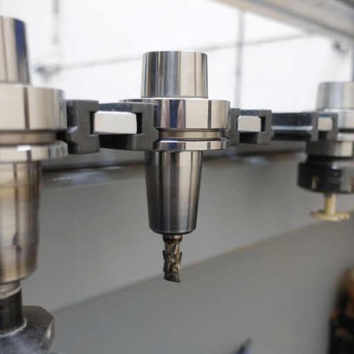 How deep can different types of CNC routers cut in a single pass?