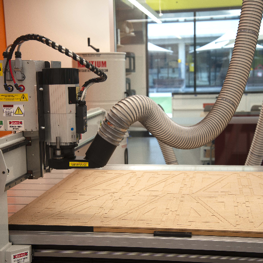 Which materials can different CNC routers effectively process?