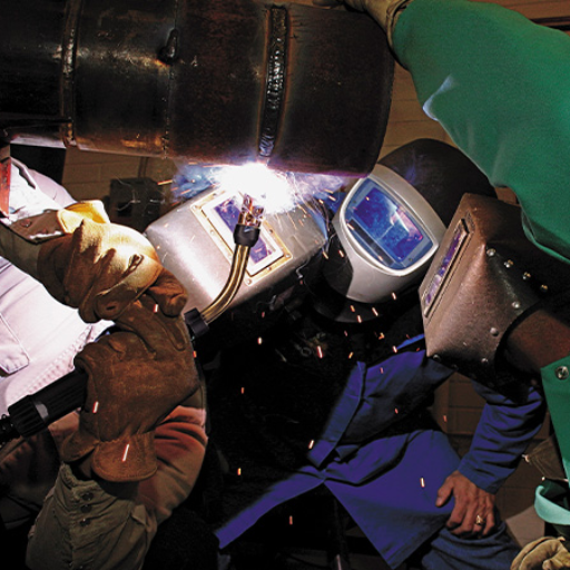 Why is overhead welding position considered challenging?